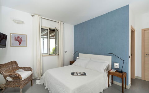 Villa Sea Star: Furniture, Wall, Interior Design, Bedroom, Wood, Floor, Bed, Flooring, Textile, Ceiling
