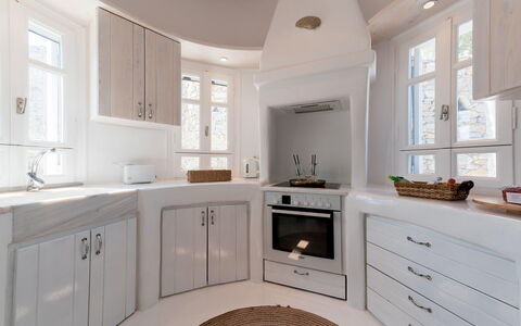 Seaside Villa: Interior Design, Ceiling, Flooring, Countertop, Cabinetry, Kitchen, Floor, Home, Room, Plumbing Fixture