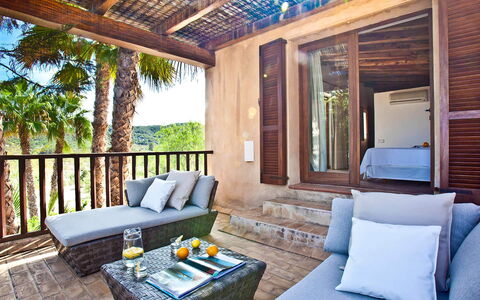 Villa Matarel: Furniture, Wood, Floor, Outdoor Furniture, Home, Resort, Chair, Balcony, Porch, Shade