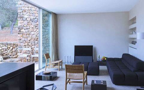 Villa Cave: Furniture, Flooring, Wall, Interior Design, Floor, Couch, Wood, Living Room, Room