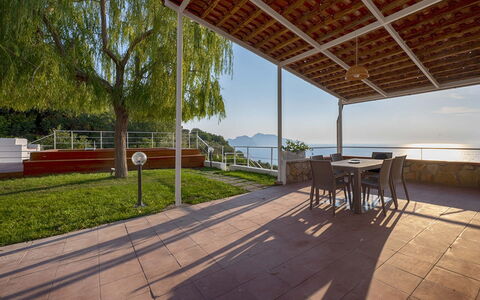 Mermaid Villa: Porch, Deck, Chair, Resort, Shade, Wood Stain, Balcony, Hardwood, Eco Hotel, Outdoor Structure