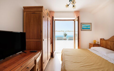 Relais Nike: Furniture, Sea, Ocean, Resort, Coast, Shade, Chair, Beach, Hotel, Bed