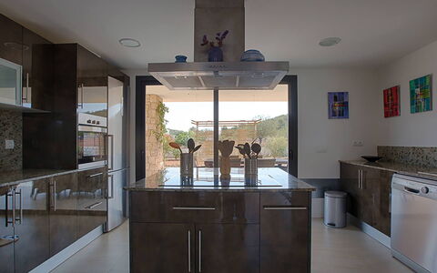 Villa Castiglioni: Furniture, Kitchen, Countertop, Kitchen Appliance, Cabinetry, Flooring, Interior Design, Wood, Floor, Major Appliance