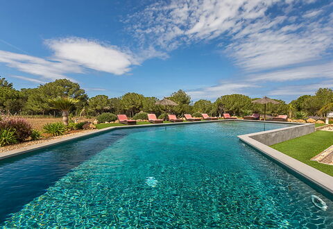 Villa Castiglioni: Blue, Water, Swimming Pool, Garden, Reflection, Landscaping, Water Feature, Resort, Tropics, Pond
