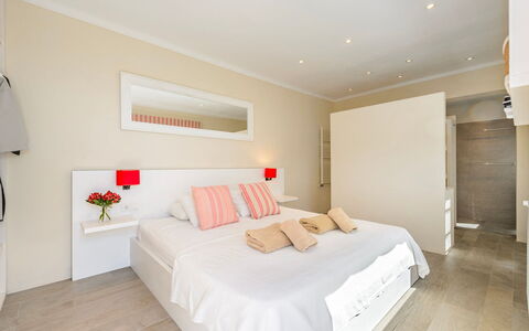 Villa Beleza: Furniture, Bed, Interior Design, Bedroom, Wall, Floor, Flooring, Wood, Room, Ceiling