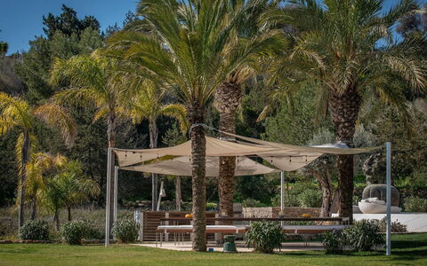 Villa Fabula: Shade, Garden, Canopy, Outdoor Structure, Gazebo, Outdoor Furniture, Landscaping, Pavilion, Lawn, Yard