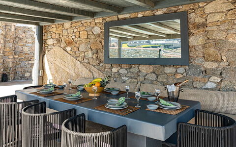 Villa Cocoon: Furniture, Table, Chair, Kitchen & Dining Room Table, Interior Design, Outdoor Furniture, Outdoor Table, Natural Material, Stone Wall, Dining Room
