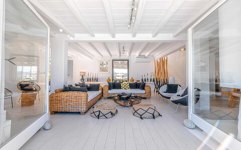 Villa Targer: Furniture, Wood, Flooring, Interior Design, Floor, Couch, Ceiling, Chair, Table, Living Room