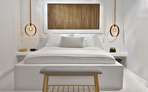 Villa Targer: Interior Design, Bedroom, Lighting, Bed, Light Fixture, Furniture, Bedding, Linens, Ceiling, Room