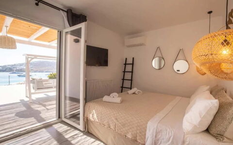 Villa Waves: Furniture, Home, Apartment, Balcony, Shade, Wood Stain, Chair, Outdoor Furniture, Houseplant, Hotel