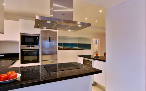 Villa Jules: Kitchen, Kitchen Appliance, Countertop, Interior Design, Furniture, Cabinetry, Major Appliance, Home Appliance, Flooring, Ceiling