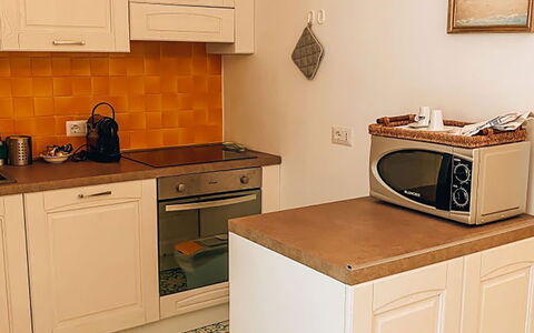 San Sebastiano: Flooring, Wood, Floor, Interior Design, Kitchen, Cabinetry, Furniture, Countertop, Kitchen Appliance, Major Appliance
