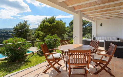 Villa Curiosity: Furniture, Wood, Chair, Outdoor Furniture, Table, Flooring, Porch, Shade, Outdoor Table, Floor