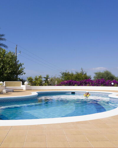 Villa Besso: Outdoor Furniture, Furniture, Swimming Pool, Umbrella, Resort, Chair, Shade, Leisure, Eco Hotel, Outdoor Table