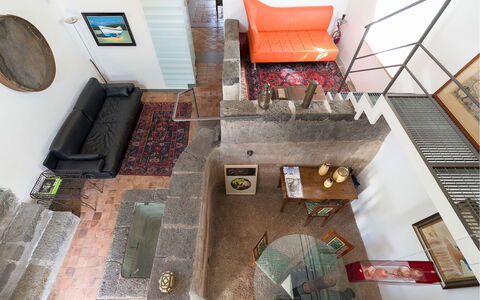Villa Carosone: Flooring, Wall, Interior Design, Furniture, Wood, Floor, Couch, Lighting, Living Room, Ceiling