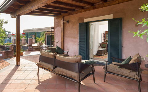 Villa Carosone: Furniture, Chair, Outdoor Furniture, Flowerpot, Floor, Shade, Houseplant, Patio, Outdoor Table, Balcony