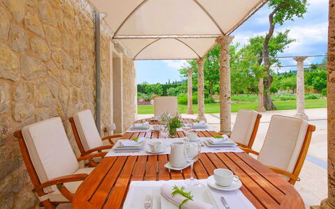 Villa Higo: Furniture, Chair, Shade, Resort, Outdoor Furniture, Kitchen & Dining Room Table, Garden, Estate, Outdoor Structure, Design