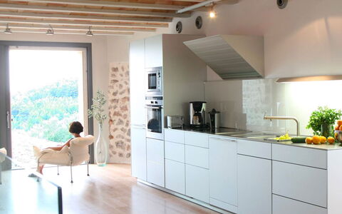 Villa Arch: Kitchen, Countertop, Furniture, Interior Design, Flooring, Kitchen Appliance, Floor, Wood, Cabinetry, Major Appliance
