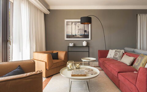 Villa Bridgitte: Furniture, Interior Design, Flooring, Floor, Couch, Wall, Living Room, Room, Home, Textile