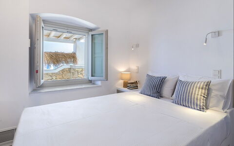 Villa Vesper: Apartment, Bedroom, Bedding, Linens, Pillow, Bed Sheet, Balcony, Hotel, Daylighting, Throw Pillow