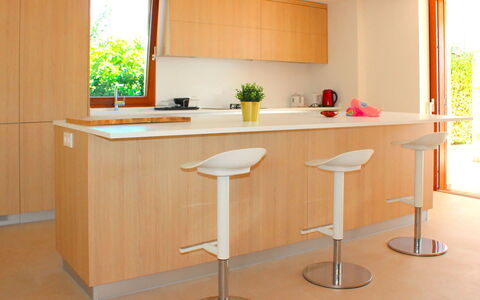 Villa Acapulco: Furniture, Flooring, Wood, Interior Design, Kitchen, Cabinetry, Floor, Bar Stool, Countertop, Wood Stain