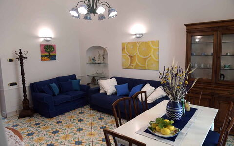 Casa Minori: Furniture, Flooring, Interior Design, Floor, Wood, Table, Living Room, Room, Couch, Chair