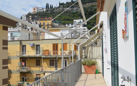 Casa Minori: Apartment, Neighbourhood, Residential Area, Balcony, Urban Design, Composite Material, Condominium, Handrail, Daylighting