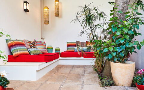 Villa Fullmoon: Furniture, Cushion, Interior Design, Flowerpot, Throw Pillow, Flooring, Living Room, Floor, Couch, Pillow