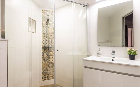 Villa Fountain: Bathroom, Interior Design, Flooring, Plumbing Fixture, Wall, Floor, Bathroom Sink, Bathroom Cabinet, Sink, Mirror
