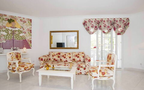 Villa Mosaic: Furniture, Interior Design, Couch, Flooring, Floor, Living Room, Textile, Table, Room, Lighting
