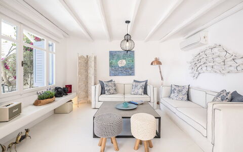 Villa Tiche: Furniture, Wall, Interior Design, Couch, Flooring, Floor, Home, Living Room, Room, Apartment