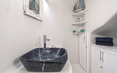 Villa Tiche: Plumbing Fixture, Bathroom, Wall, Interior Design, Sink, Tap, Bathroom Sink, Plumbing, Bathroom Cabinet, Flooring