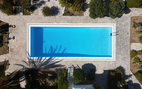 Mikonos Pool House 6: Swimming Pool, Blue, Water, Resort, Composite Material, Leisure, Shade, Eco Hotel, Outdoor Furniture, Water Feature