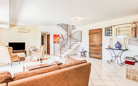 Villa i Tre Fratelli: Furniture, Couch, Flooring, Interior Design, Floor, Living Room, Apartment, Home, Ceiling