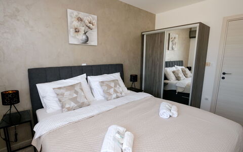 Paula: Bed, Furniture, Interior Design, Bedroom, Floor, Flooring, Wood, Bed Sheet, Bedding, Room