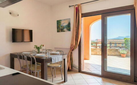 Vacanze Nespolo: Kitchen & Dining Room Table, Apartment, Wood Stain, Chair, Hardwood, Houseplant, Balcony, Kitchen, Villa, Dining Room