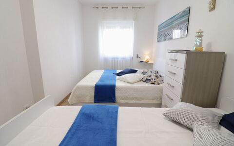 Luisa: Bed, Bedroom, Furniture, Bed Sheet, Bedding, Floor, Linens, Interior Design, Flooring, Room