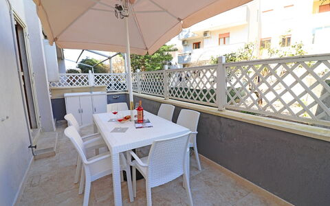 Luisa: Flooring, Floor, Furniture, Outdoor Furniture, Chair, Outdoor Table, Balcony, Shade, Kitchen & Dining Room Table, Wood Stain