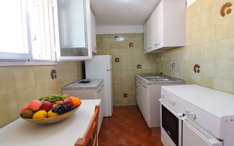 Isabel: Kitchen, Kitchen Appliance, Countertop, Major Appliance, Flooring, Wood, Floor, Cabinetry, Kitchen Sink, Interior Design