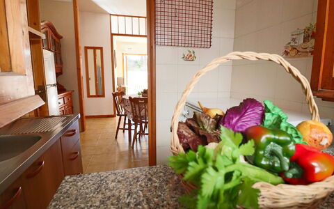Cecilia: Wood, Kitchen, Countertop, Interior Design, Furniture, Kitchen Appliance, Room, Wood Stain, Cabinetry, Natural Foods