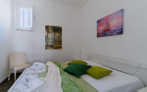 Azzurra: Wall, Bedroom, Bed, Floor, Furniture, Interior Design, Flooring, Bed Sheet, Bedding, Room