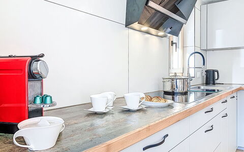 Bon-Accueil: Kitchen, Kitchen Appliance, Countertop, Home Appliance, Flooring, Interior Design, Cabinetry, Major Appliance, Furniture, Plumbing Fixture