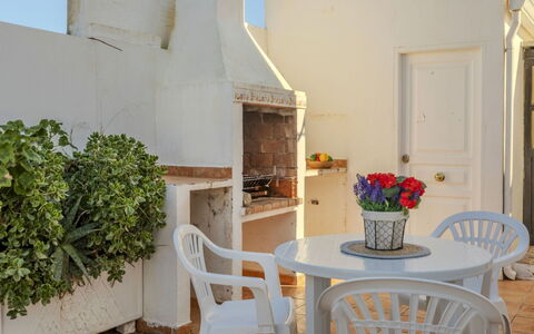 La Rambleta: Furniture, Chair, Outdoor Furniture, Flowerpot, Shade, Houseplant, Balcony, Outdoor Table, Coffee Table, Kitchen & Dining Room Table