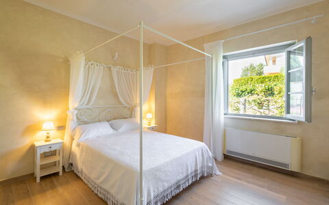 Podere Galieni: Furniture, Interior Design, Bed, Floor, Flooring, Wall, Bedroom, Wood, Ceiling, Room