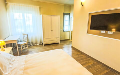 Podere Galieni: Interior Design, Wall, Floor, Flooring, Wood, Ceiling, Bedroom, Lighting, Bed, Room