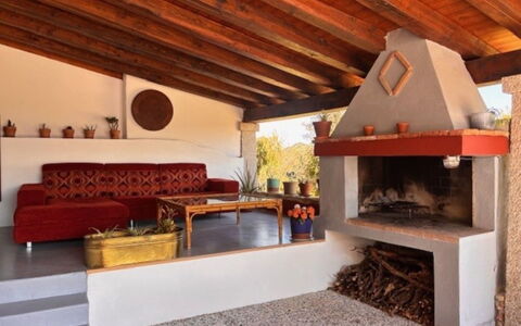 Silos: Wood, Furniture, Home, Hearth, Wood Stain, Chair, Living Room, Natural Material, Houseplant