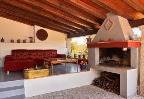 Silos: Wood, Furniture, Home, Hearth, Wood Stain, Chair, Living Room, Natural Material, Houseplant