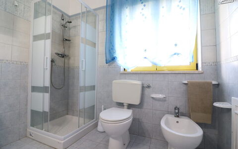 Lucia: Bathroom, Plumbing Fixture, Flooring, Toilet Seat, Toilet, Floor, Interior Design, Tap, Sink, Plumbing