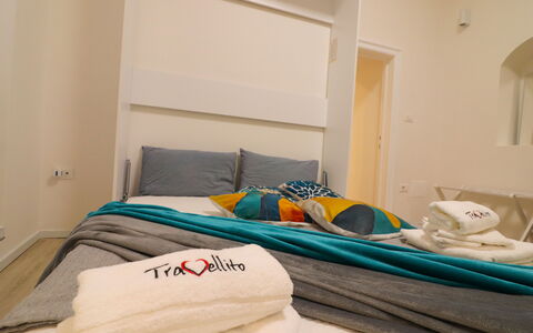 Penelope'S House Centro Storico: Furniture, Interior Design, Flooring, Floor, Bedroom, Wood, Room, Textile, Ceiling, Bed