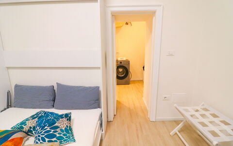 Penelope'S House Centro Storico: Interior Design, Floor, Flooring, Furniture, Bedroom, Wood, Room, Bed, Textile, Linens